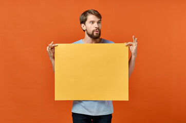 male marketing poster advertising model orange paper sheet mockup