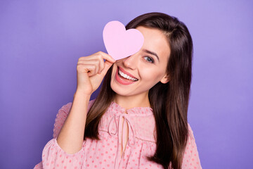 Wall Mural - Photo of lovely cheerful person hold heart card cover eye wear retro outfit isolated on purple color background