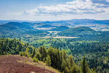 View on the Chaine des Puys volcanoes from the top of the Puy de Lassolas volcano in Auvergne, France