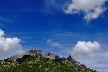 gorgeous mountains with a blue sky and clouds