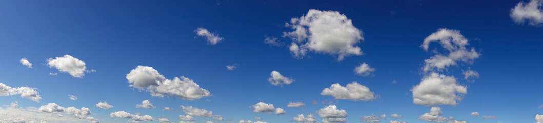 Wall Mural - Panorama. Beautiful blue sky and white clouds.