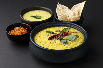 Wall Mural - Moong Dal or Split Yellow Lentils, Indian Dish
Mung Dal Tadka Curry , Indian traditional food
