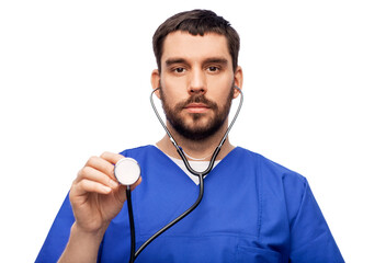 Wall Mural - healthcare, profession and medicine concept - doctor or male nurse in blue uniform with stethoscope over white background