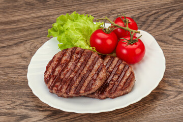 Grilled burger cutlet with sauce