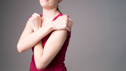 Canvas Print - Tired woman feeling pain, massaging tense muscles