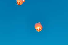 Releasing Flying Lanterns At Dusk