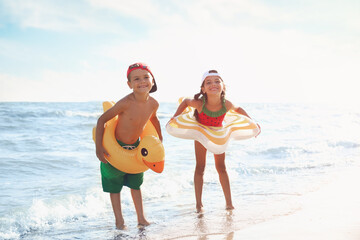 Sticker - Cute children enjoying sunny day at beach. Summer camp