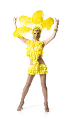 Party. Beautiful young woman in carnival, stylish masquerade costume with feathers dancing on white studio background. Concept of holidays celebration, festive time, dance, party, having fun