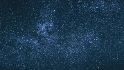 blue night starry sky with glowing stars. bright glow of sky stars and milky way galaxy. 4k. natural
