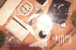 © peshkova - Double exposure of financial chart hologram over desktop with phone. Top view. Mobile trade platform concept.