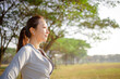 © Tom Wang - closeup beautiful young woman face before running in the park at  morning
