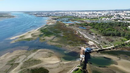 Wall Mural - Natural park, salt pans and white town of Olhao, Algarve, Portugal