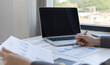 © Kantamard - Financial businesswomen analyze the graph of the company's performance to create profits and growth, Market research reports and income statistics, Financial and Accounting concept.