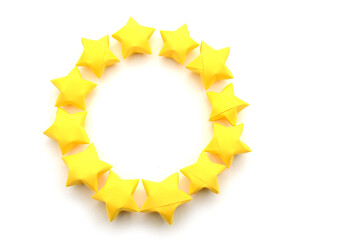 Wall Mural - Yellow origami stars in circle sign