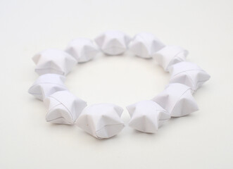Wall Mural - White origami lucky stars on white