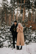 © Maryna - couple in winter forest