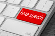 © New Africa - Red button with text Hate Speech on computer keyboard, closeup