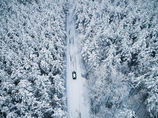 Poster - Slippery Dangerous Driving Conditions on the Roads After Heavy Snowfall. Drone View