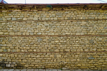 Azerbaijan, the village of Lahic. In this isolated hight mountain village a traditional built wall. With wooden elements to protect against earthquake.