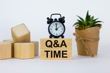 q and a, questions and answers time symbol. concept words 'q and a time' on wooden blocks on a beaut