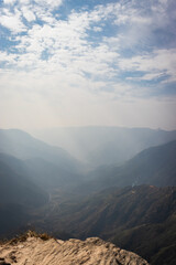 misty mountain range covered with white mist