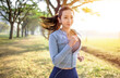 © Tom Wang - young woman running in the park at  morning