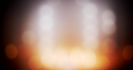 Blurred, abstract and creative background with a play of golden lights