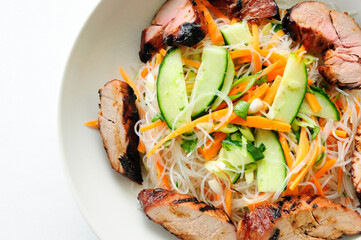 Sticker - brined pork tenderloin with rice noodles in cool summer salad