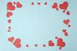© AndhikaRaya - Heart shaped paper sticked on blue background. Emblem of love for happy women, beloved mother, birthday cards and valentine greeting designs. Valentine's day backgrounds. Templates to convey our love.