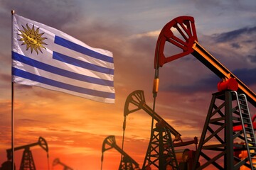 Wall Mural - Uruguay oil industry concept. Industrial illustration - Uruguay flag and oil wells with the red and blue sunset or sunrise sky background - 3D illustration