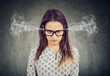 © Feodora - Angry fuming woman feeling frustrated