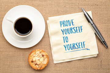 Wall Mural - prove yourself to yourself -inspirational handwriting on a napkin with a cup of coffee, personal development and self improvement concept
