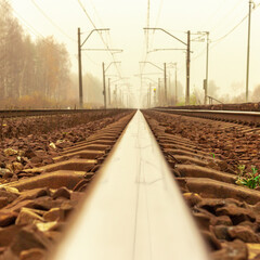 long train rail in foggy day