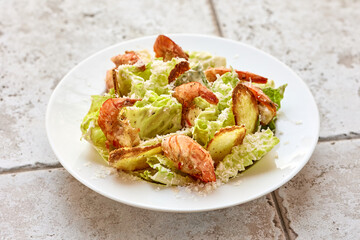 Canvas Print - portion of cesar salad with grilled prawns