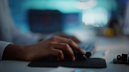 Modern Electronics Research, Development Facility: Engineer Working on Computer, Typing with His Hands on a Keyboard. Scientist Design PCB, Silicon Microchips, Semiconductors. Closeup Focus on Hands 
