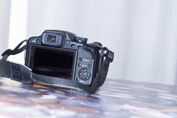 Front view of a digital camera on a table
