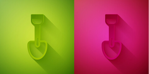 Poster - Paper cut Shovel toy icon isolated on green and pink background. Paper art style. Vector.