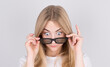 © Studio Nova - Young woman with glasses is very surprised looking down and lowering her glasses. Surprise and shopping concept on white background.