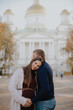 © ShevarevAlex - Young couple man and woman in the city landscape in the park