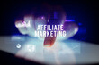 © ra2 studio - Finger touching tablet with charts and AFFILIATE MARKETING inscription, business concept