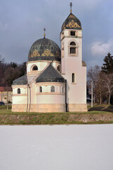 Wall Mural - Greek Catholic Church on the frozen lake in Pribic, Croatia