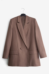 Women's blazer on a hanger