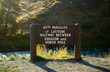 Sign marking the Northern Hemisphere's 45th parallel of latitude at the northern edge of Yellowstone National Park