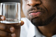 Water Mouth Gargle And Rinse. African American Man