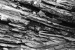 close-up of shale rock running diagonally in black and white