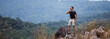Man backpacker nature travel, standing and shout on mountain. Hiking trip concept.