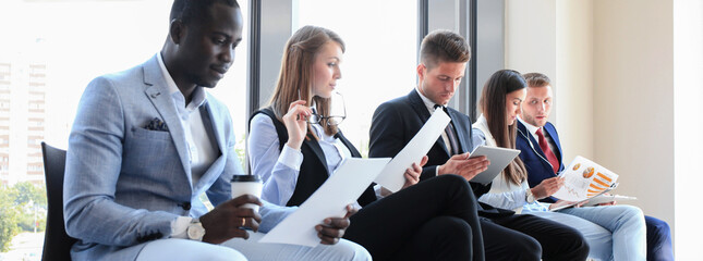 Wall Mural - Business people waiting for job interview.