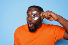 Man Search Something With A Magnifier Lens With Surprised Expression