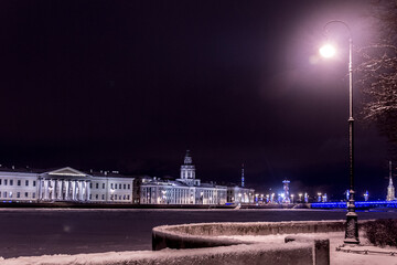 Neva river embankment and the lantern in St. Petersburg in winter