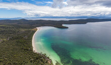 Beautiful High Angle Aerial Drone View Of Kingfisher Beach And Jetty Beach In Great Taylors Bay, South Bruny National Park, Bruny Island, Tasmania, Australia. Tasmania Mainland In The Background.